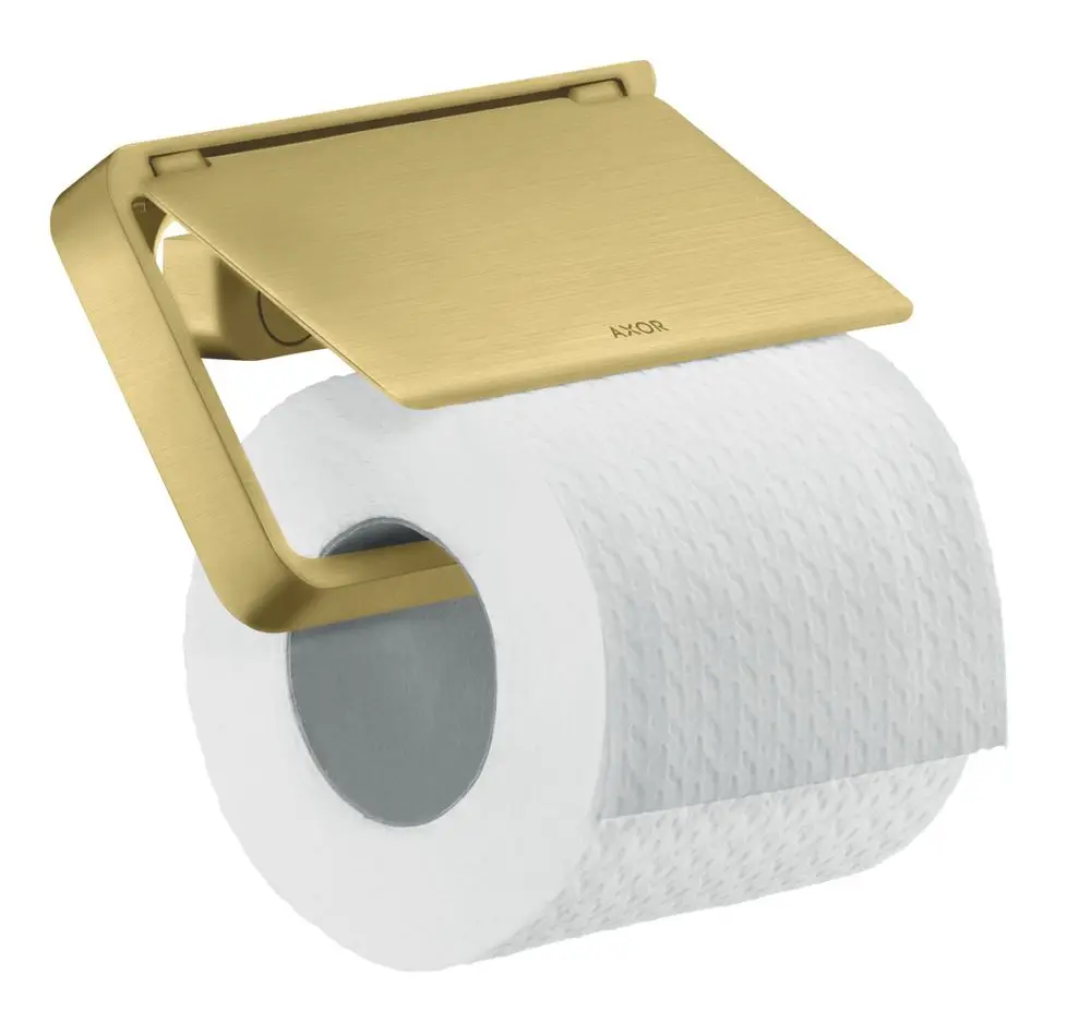 Toilettenpapierhalter aus gebürstetem Messing mit Deckel, montiert an der Wand, mit einer Rolle Toilettenpapier. Produkt von AXOR.